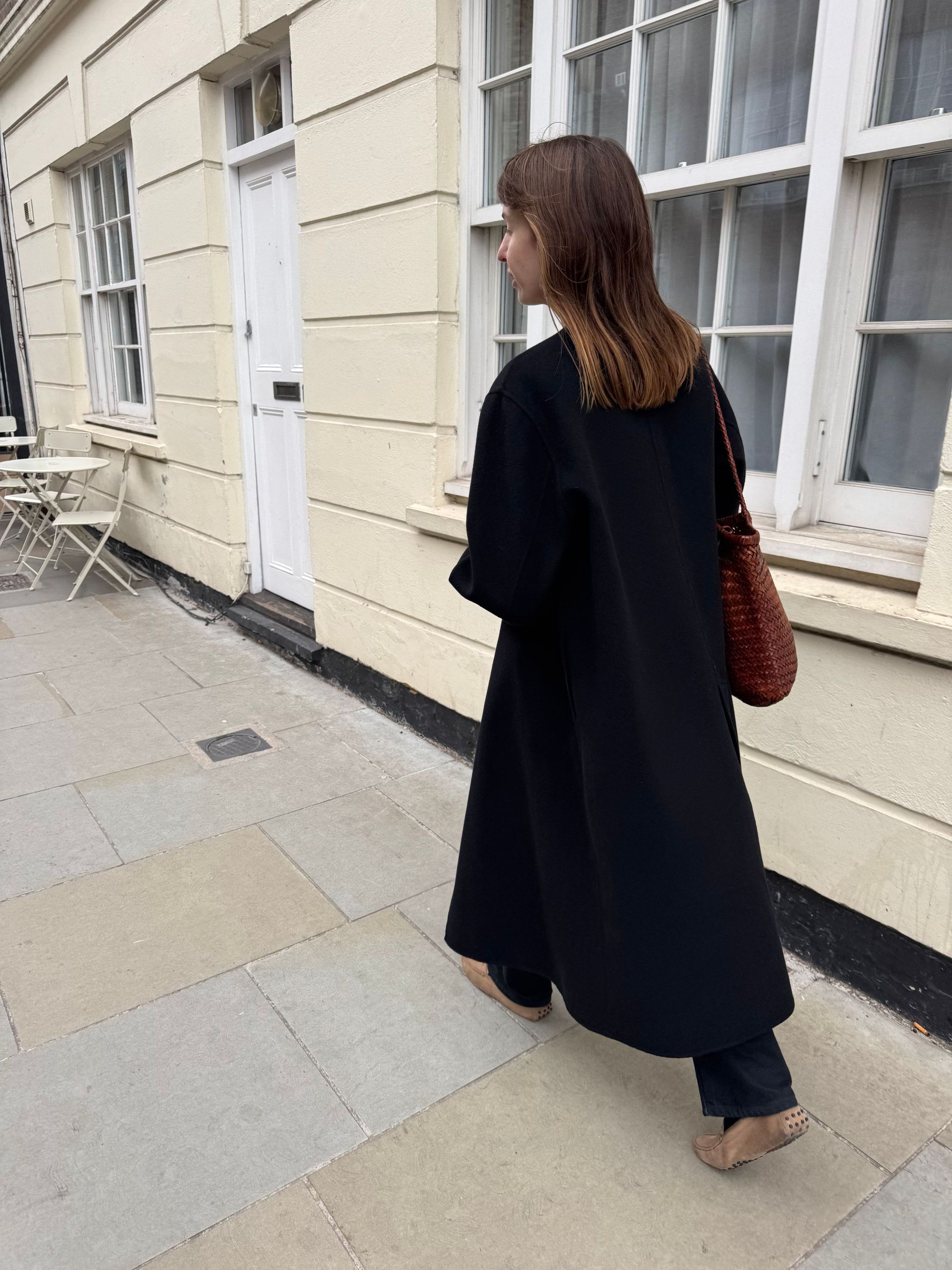 A woman walking on the streets of London