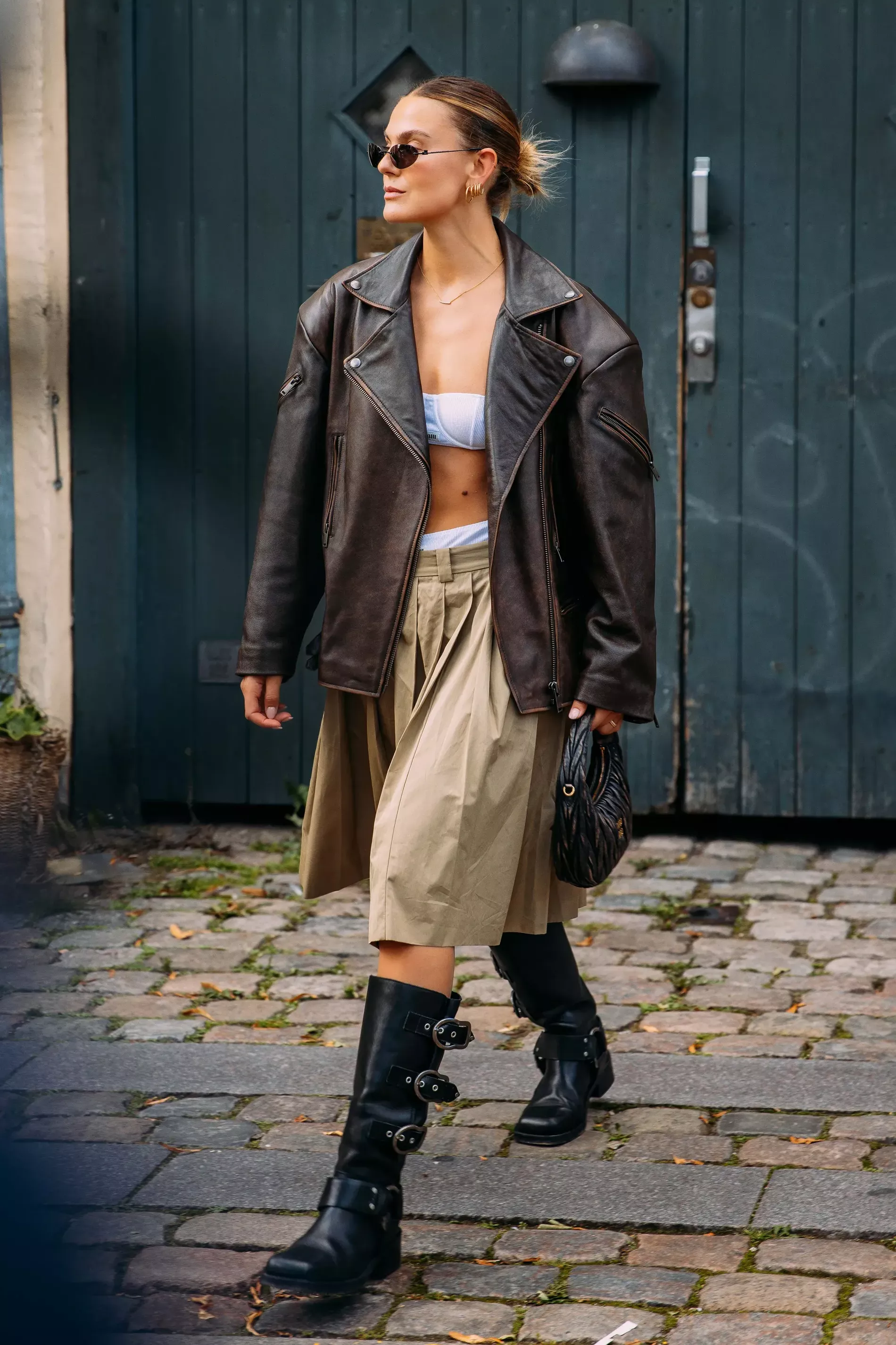 Guest at CPHFW SS24 wears the Moto boot trend