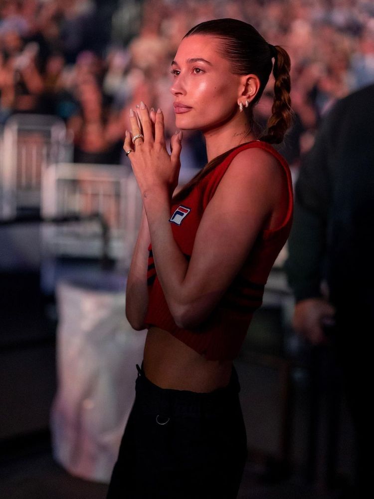 Hailey Bieber wears red vintage knit by Worn Vintage