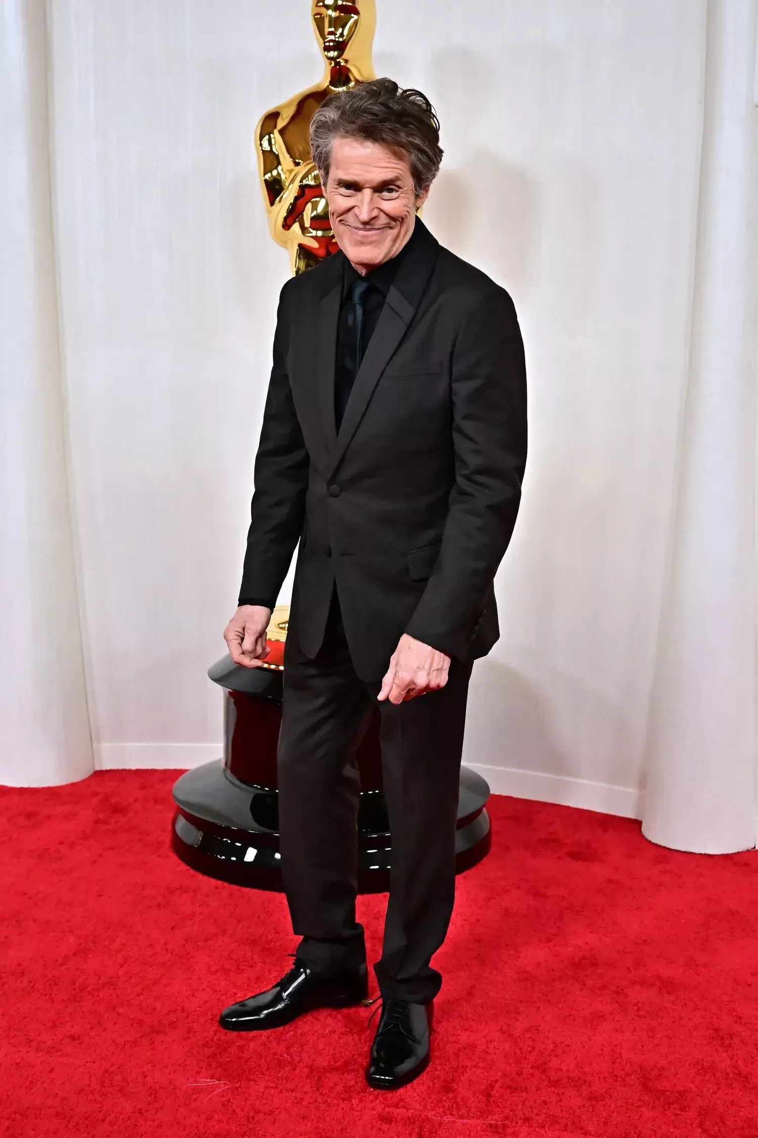 Willem Dafoe on the Oscars 2024 red carpet