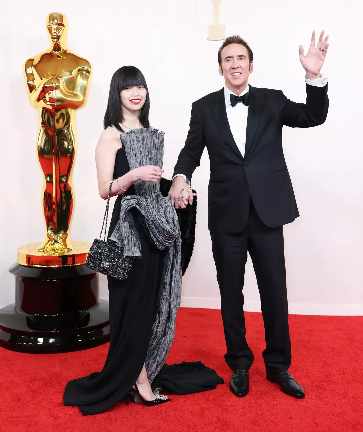 Nicolas Cage and Riko Shibata on the Oscars 2024 red carpet