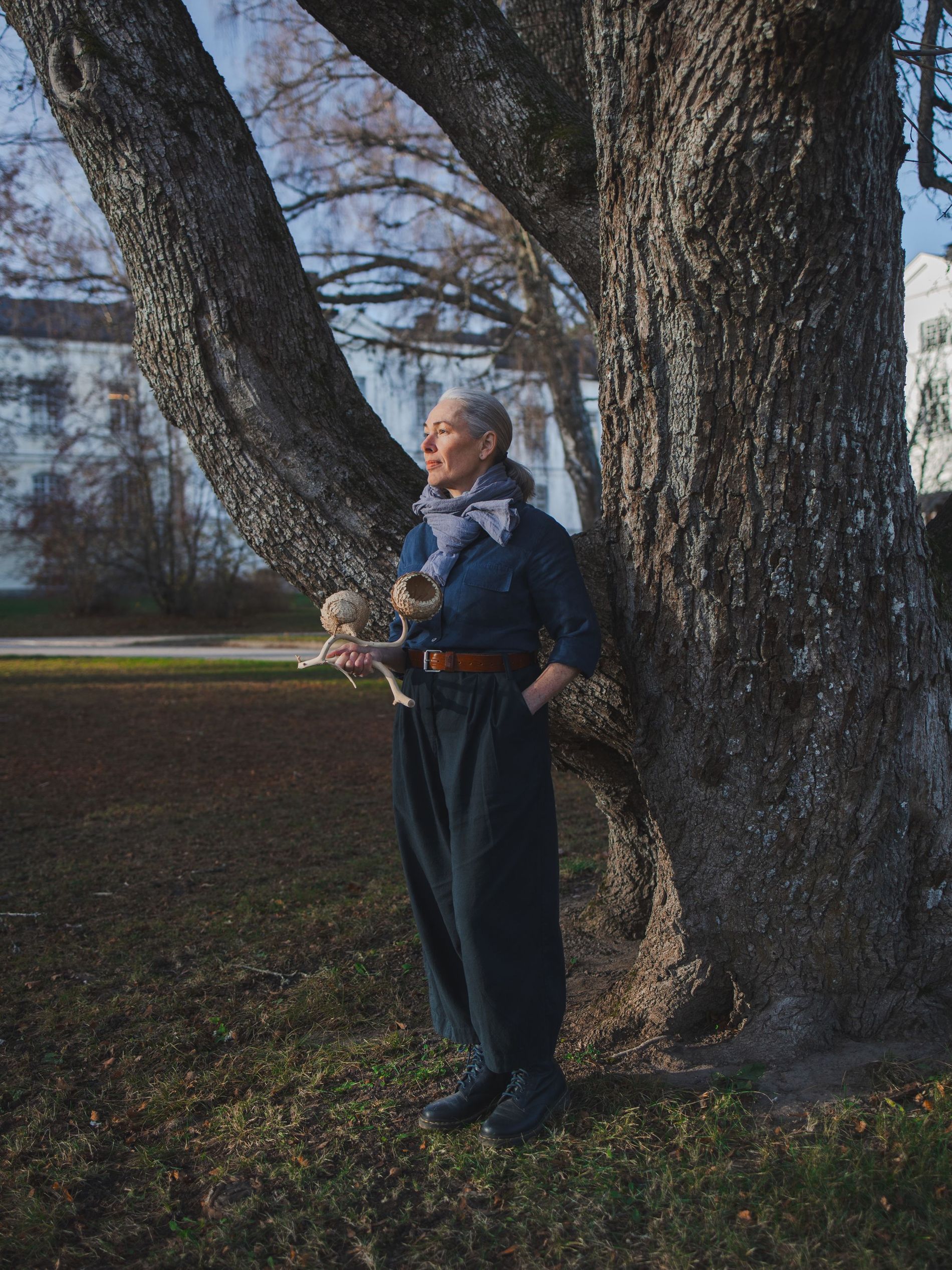 A woman standing in a park