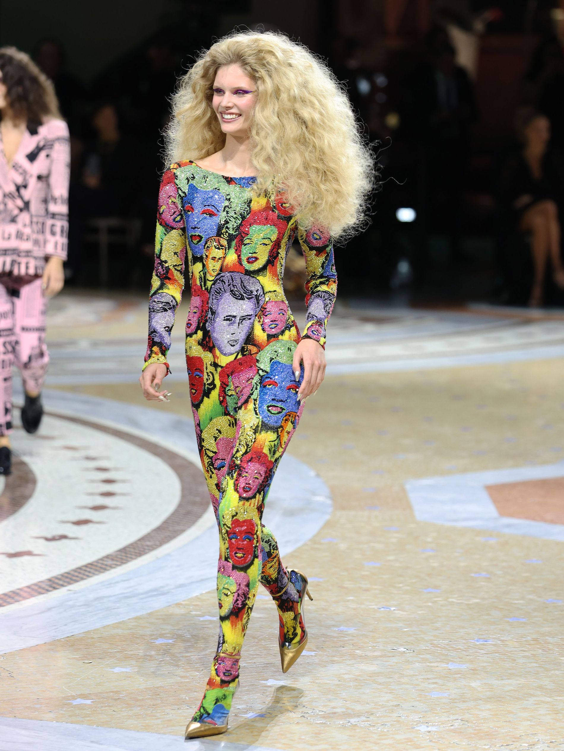 Ida Heiner in Milan fashion week wearing Andy Warhol-inspired pop art bodysuit with a Marilyn Monroe and James Dean print from Versace's Spring 2018 tribute collection