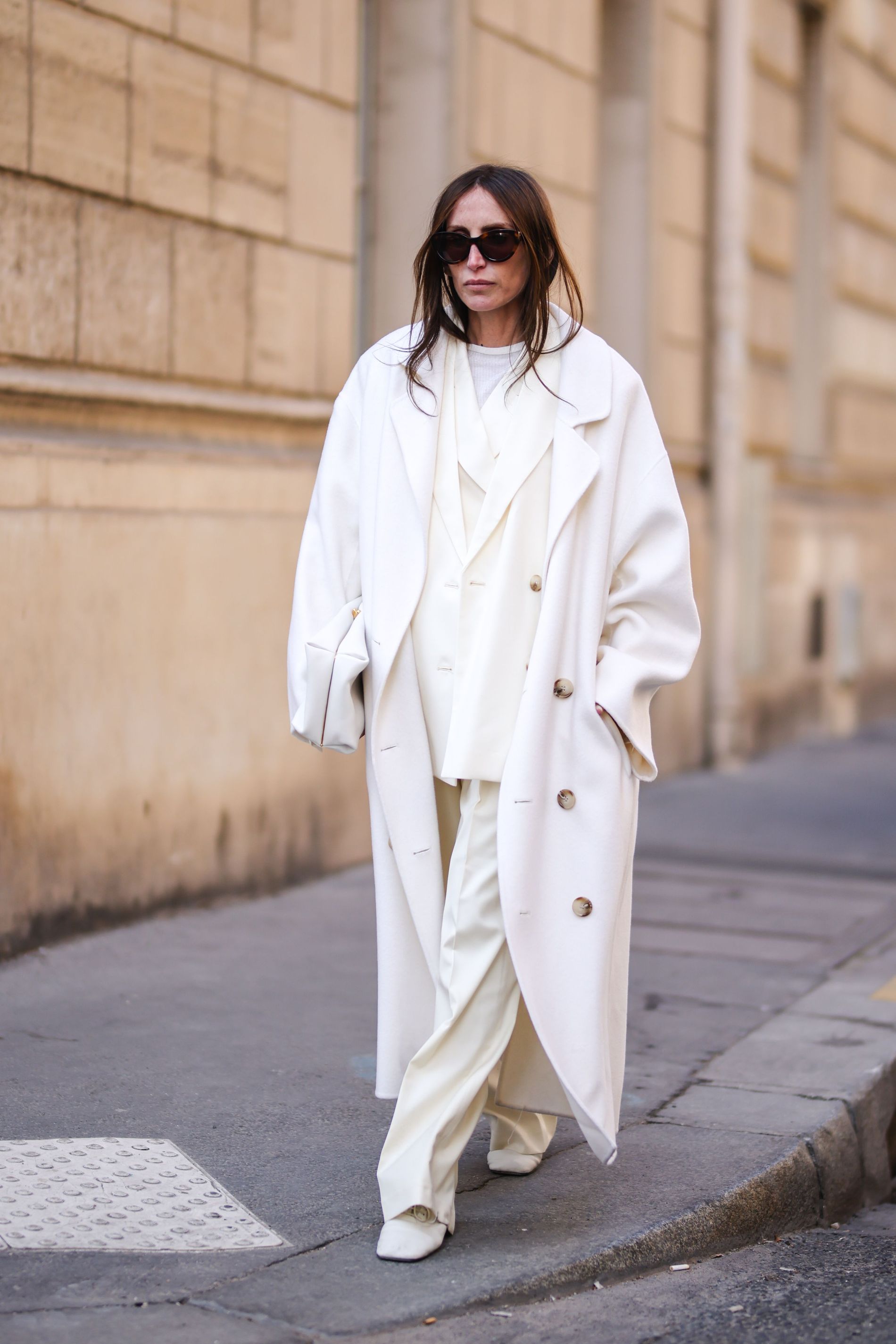 White and cream monochrome look with layered coats