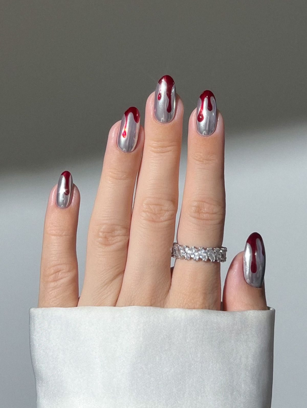 Red and chrome Halloween nail design