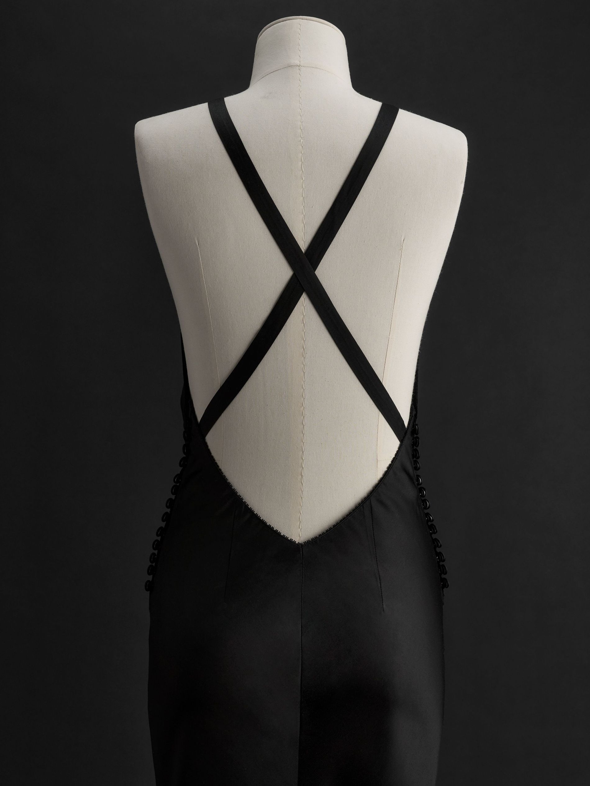 A close up of the back of The Nightgown in black designed by Benon 