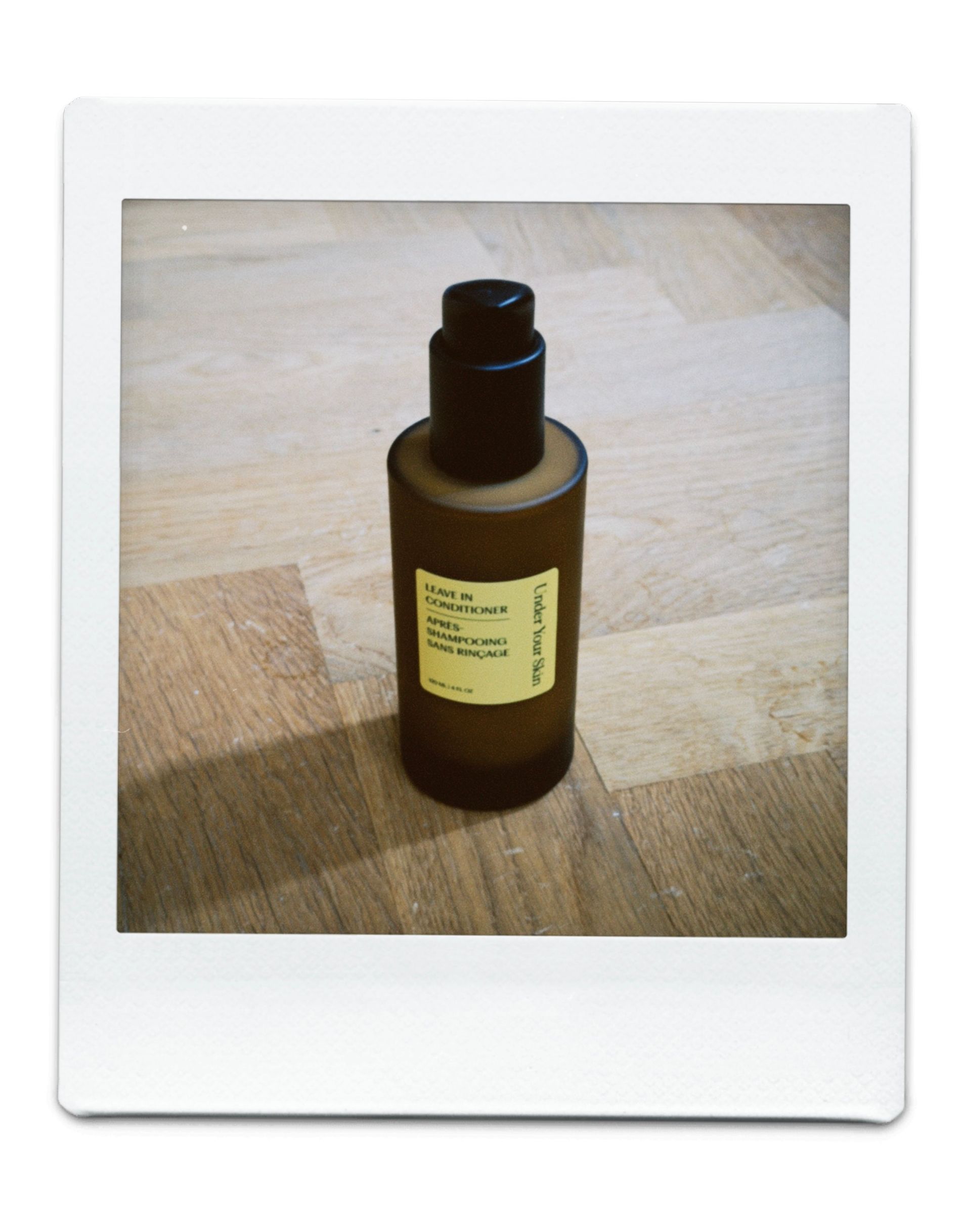 A brown bottle with yellow tag on it