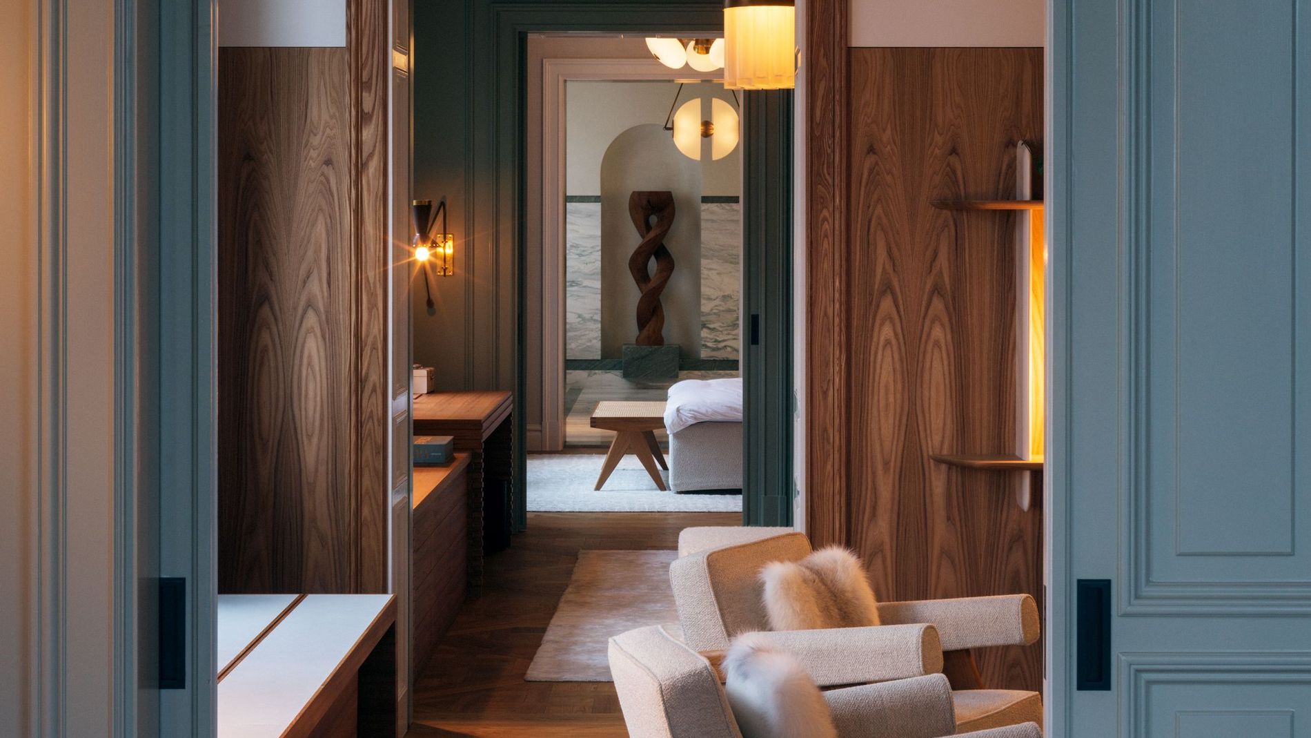 A spacious apartment rendered in white, blue and wood